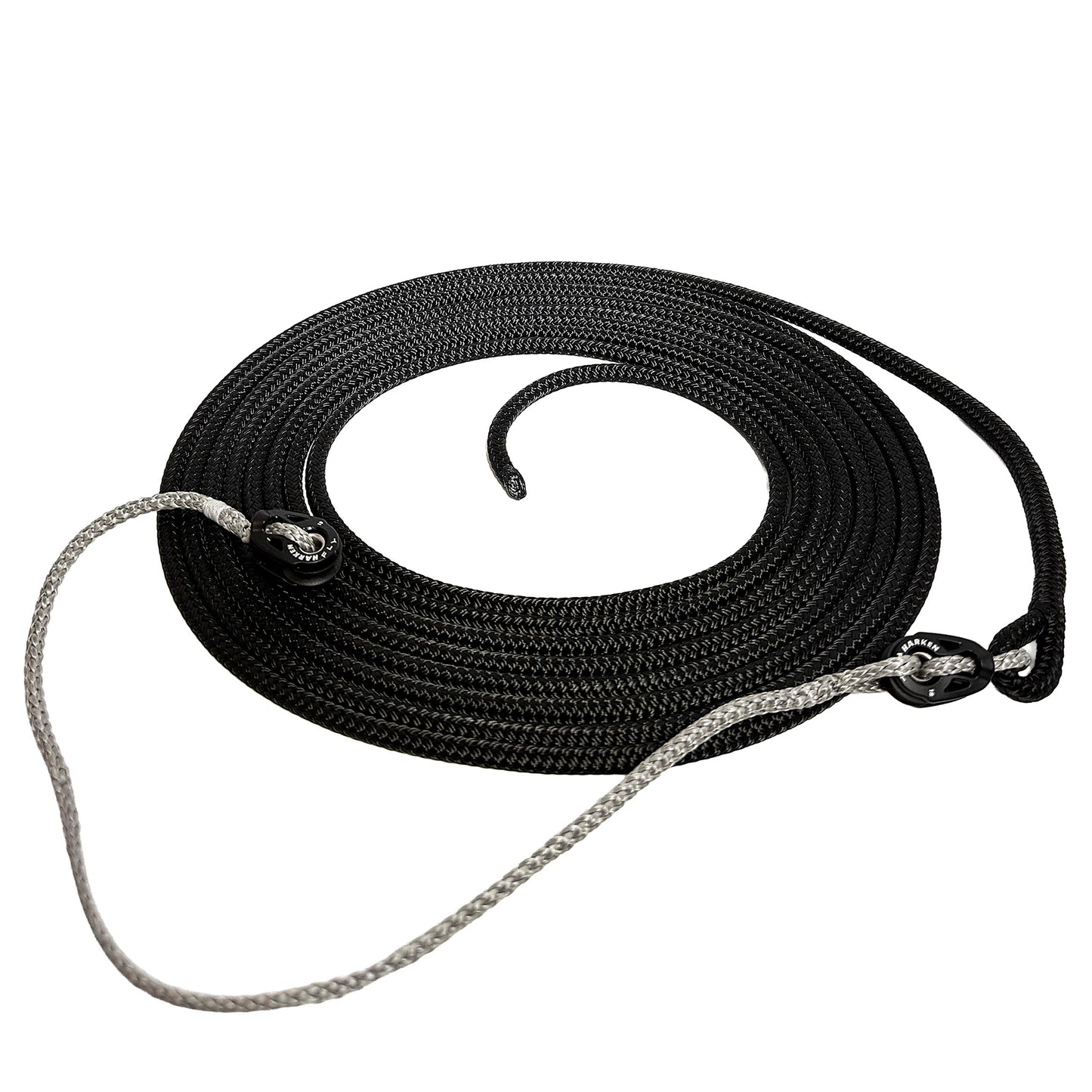 Black line with spliced eye on one end connected to grey Amsteel spectra line with harken pulleys at each end of the spectra line.
